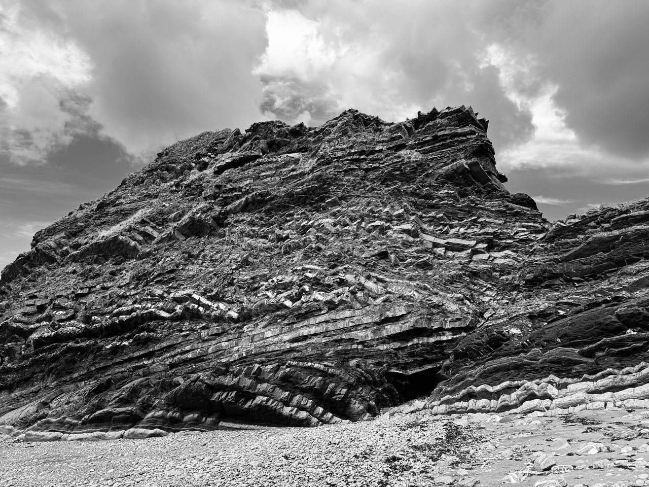 Fold. Rock bent into waves by the weight of the land.