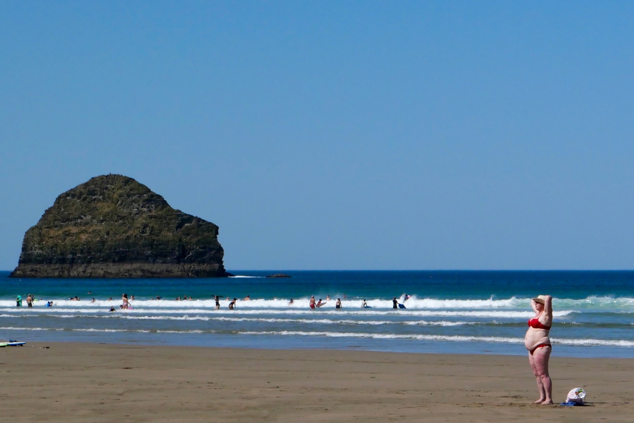 Vertical Sunbathing. Taking in the summer sun at Trebarwith Strand.